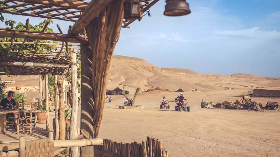 From Marrakech: Agafay Desert Camel Ride and Dinner and Show - Mint tea beneath the caidal tent