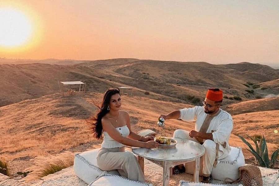 From Marrakech: Agafay Desert, Camel Ride, Dinner, Fire Show - Tea, dinner, music, and fire after dark