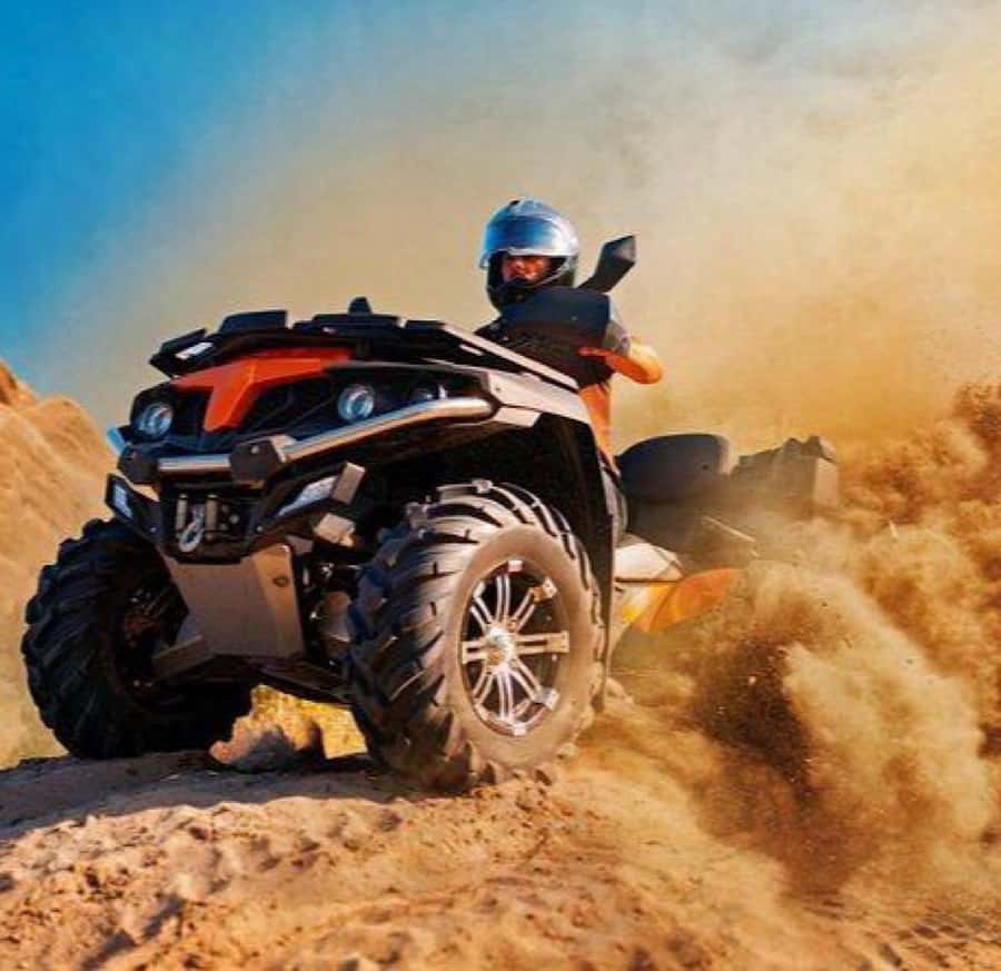 From Marrakech: Agafay Desert Quad Biking with Dinner & Show - Riding Toward the Atlas Mountains at Sunset
