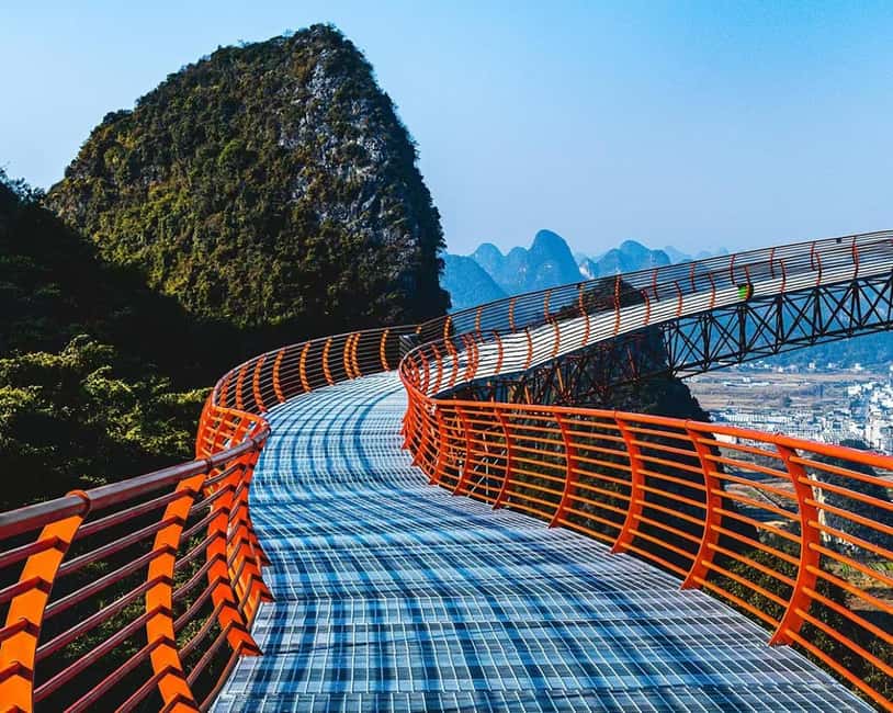 Guilin: Cave, Yulong Rafting, Glass-bottomed skywalk & Show - Ruyi Peak adds height, glass, and a few nerves