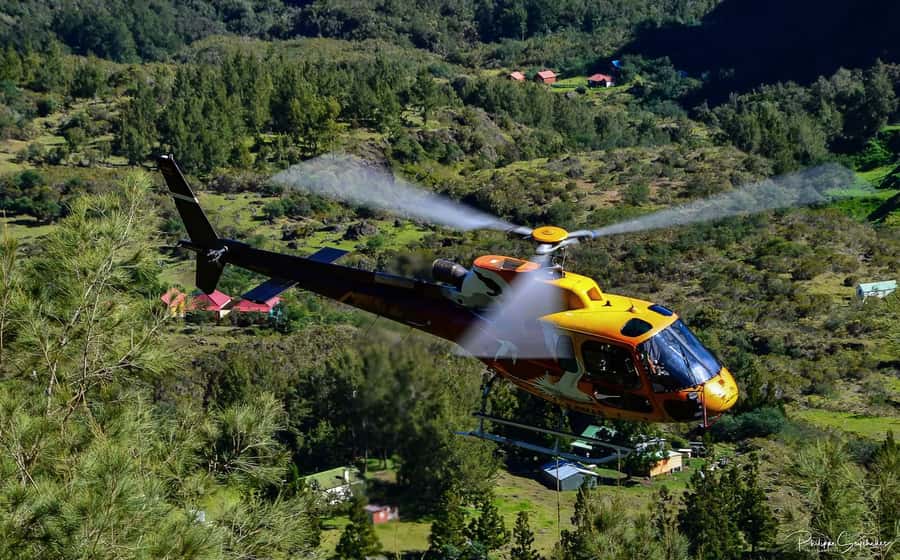 Helicopter flight from St Pierre over Réunion's 3 cirques - Cilaos, where walls rise toward Piton des Neiges