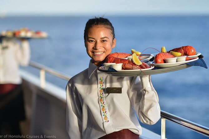 Honolulu: Three Star Deluxe Sunset Dinner Cruise and Show - Diamond Head and the Oahu coastline at sunset
