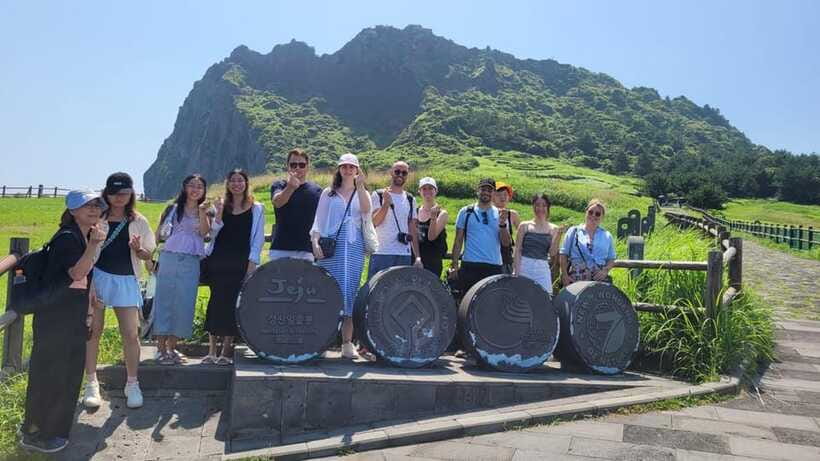 Jeju: Eastern UNESCO Sites Tour with Haenyeo Show - Climbing Seongsan Ilchulbong