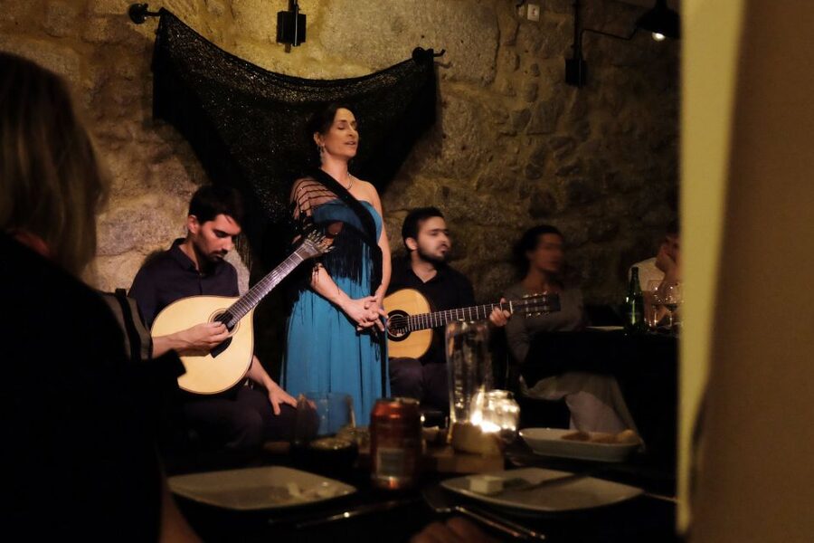 Lisbon: Fado Show and Portuguese Dinner - Meeting a red-shirted guide at Praça Luís de Camões
