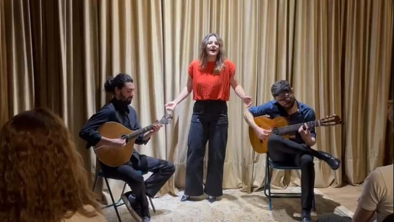 Lisbon: Live Fado Show in Historic Alfama with Port Wine - Listening to the singers and musicians