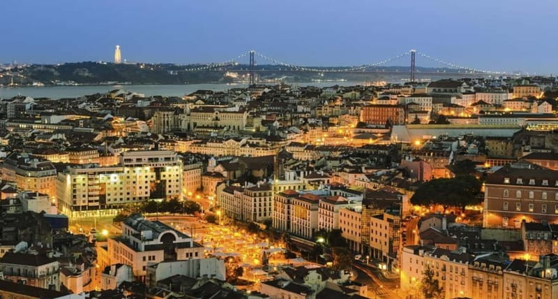 Lisbon: Private Night Tour with Fado Dinner Show - The illuminated route through central Lisbon