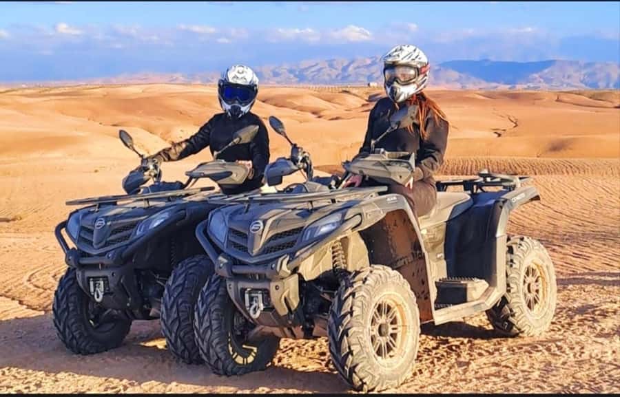 Marrakech: Agafay Desert Camel, Quad Bike & Dinner Show - Quad biking across rocky desert trails