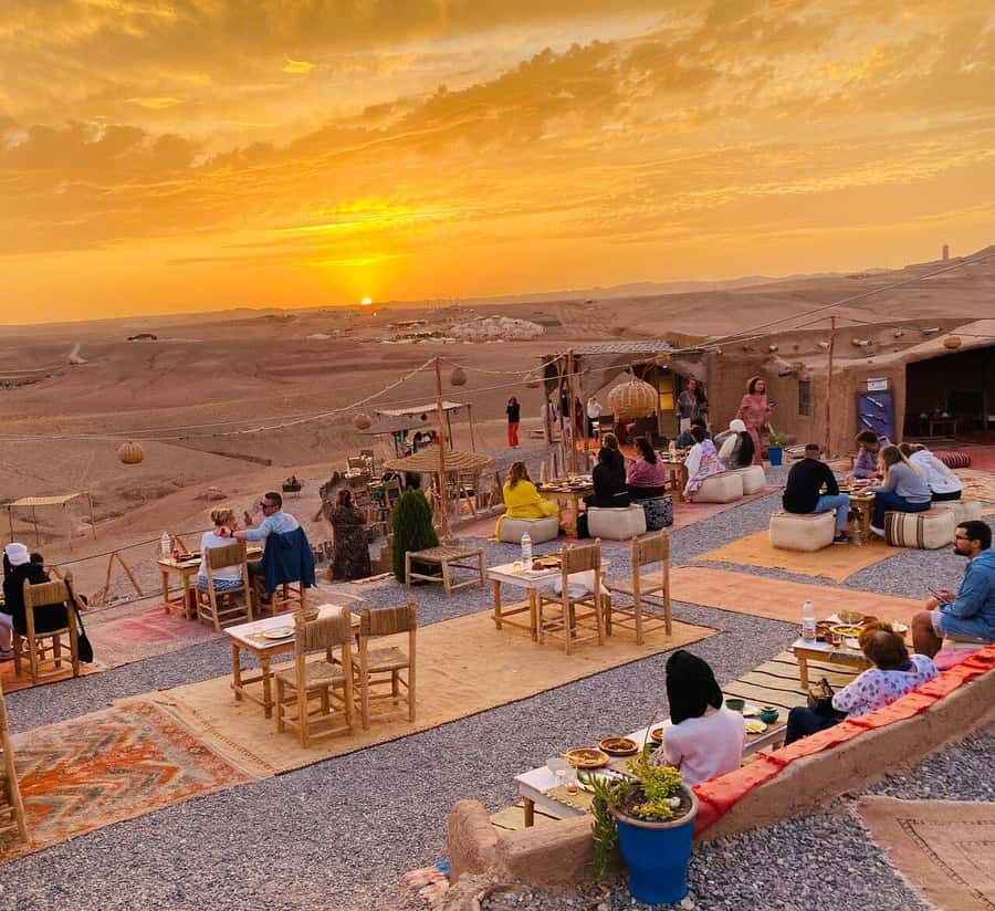Marrakech: Agafay Desert Dinner Show with Sunset Camel Ride - Riding camels as the sun drops