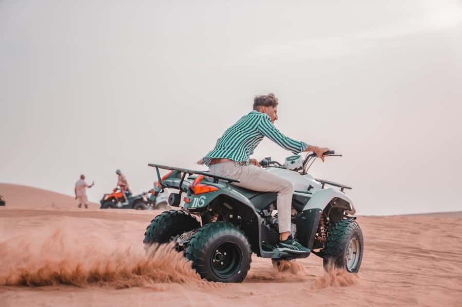 Marrakech: Agafay Desert Quad Bike with Camels & Dinner Show - Quad Biking Across Agafay