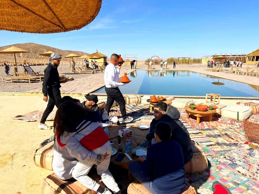 Marrakech: Agafay Desert Quad Biking & Dinner Show - What the guides add to the evening