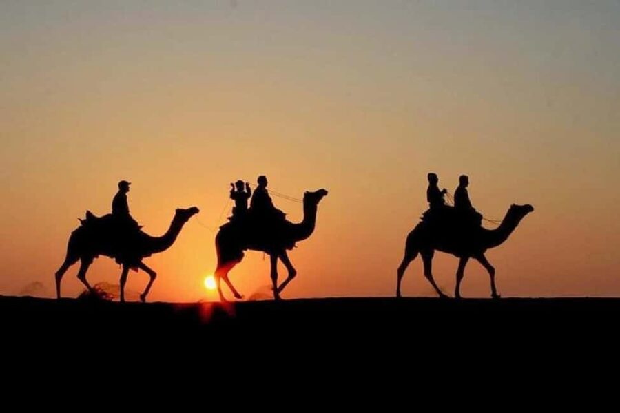 Marrakech: Agafay Desert Sunset, Camel Ride, Dinner and Show - Berber music, fire, and the camp atmosphere