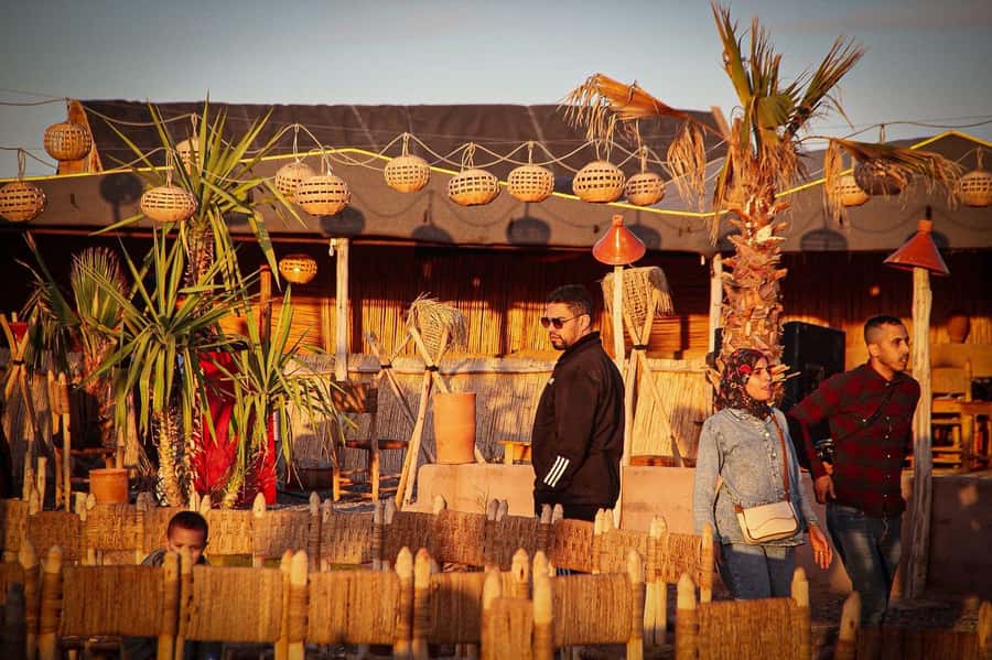 Marrakech: Camel Ride, Dinner, Pool, and Fire Show in Agafay - Pool time at the desert camp