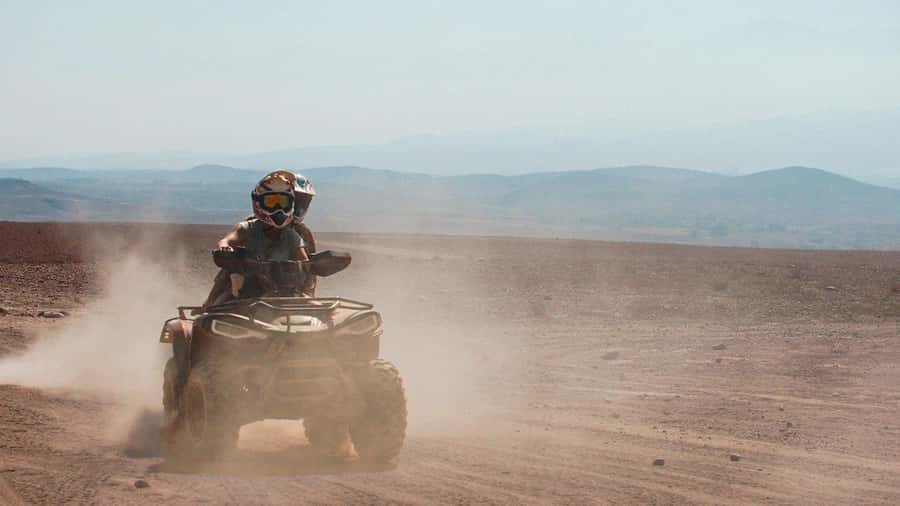 Marrakech Desert Sunset: Quad Biking, Dinner & Fire Show - Dinner with Moroccan dishes and mint tea