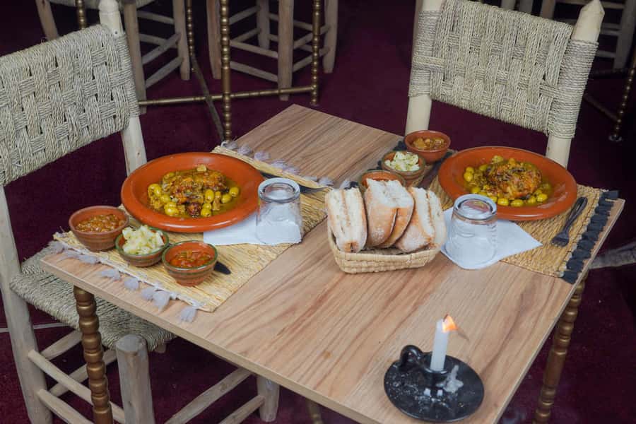Marrakesh: Agafay Desert 3-Course Dinner Show & Pool Access - Sunset over a rocky desert setting