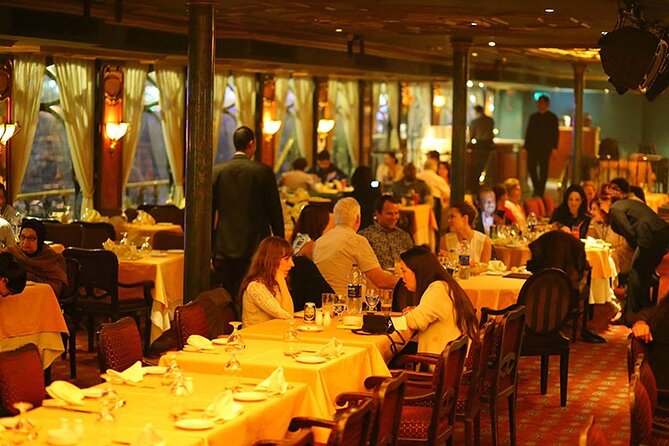 Nile Maxim Dinner Cruise In Cairo - Tannura and Belly Dancer-Oriental Show show - Belly dancing, Tanura, and the stage program