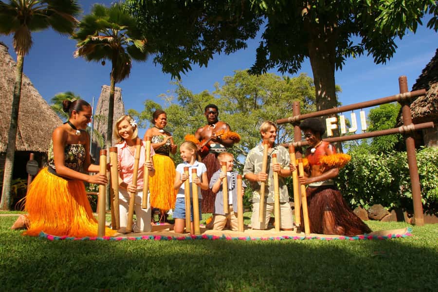Oahu: Islands of Polynesia and "HA: Breath of Life Show" - Fiji village: music, tattoos, and a six-story temple