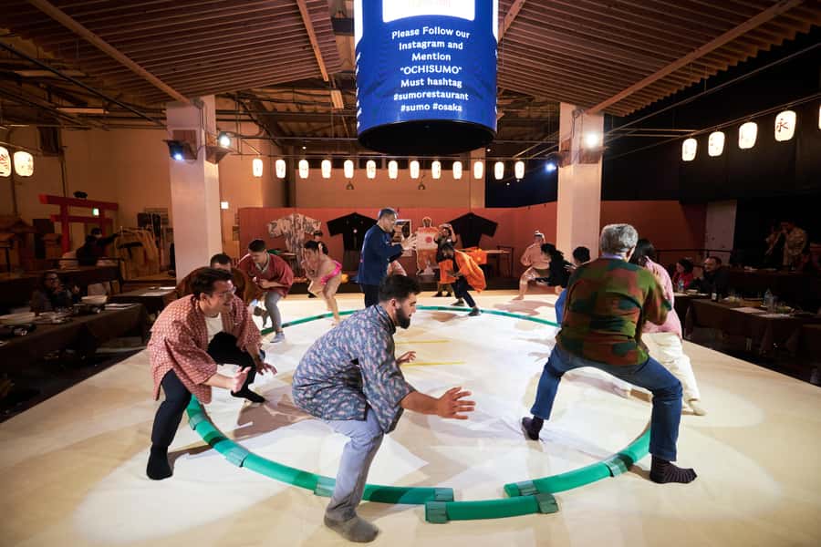 Osaka: Sumo Show & Experience w/ Optional Kimono & Hot Pot - Taking Your Turn Against a Rikishi