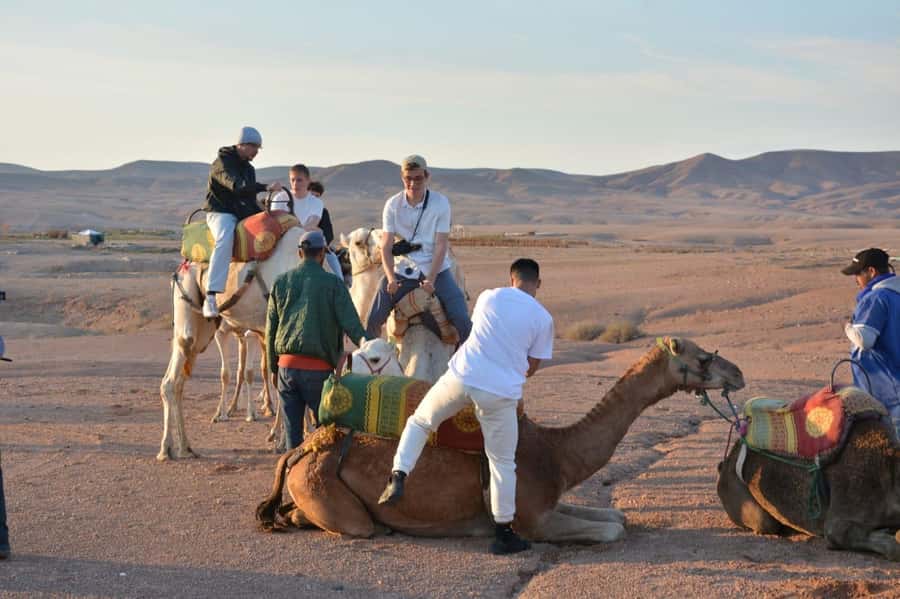 Overnight Agafay Desert Camel Ride Dinner show & Sunset - Sunrise and a generous Moroccan breakfast