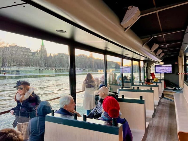 Paris: Day or Evening River Cruise with Musical Ambiance - The Louvre, Concorde, and the grand western riverfront