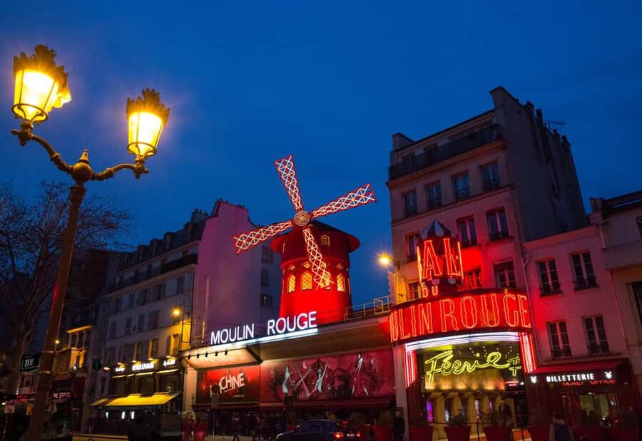 Paris: First Show Moulin Rouge with Champagne & Seine Cruise - Inside Féerie, the Moulin Rouge revue