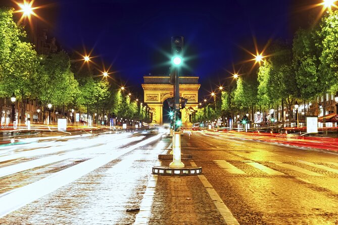 Paris Illuminations Tour with Moulin Rouge Show and Cruise Option - Paris by night begins near the Eiffel Tower
