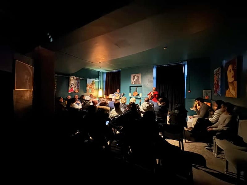 Porto: Intimate Fado Show & Port Wine in Trindade Noble Hall - A convenient stop near Aliados Avenue