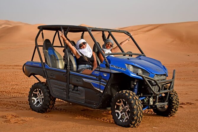 Premium Desert Safari With BBQ Dinner & Belly Dance - Sandboarding, camels, and the sunset pause