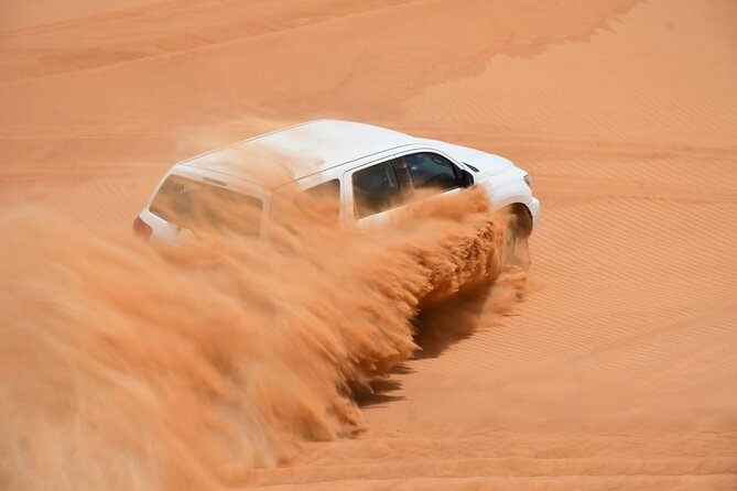 Premium Desert Safari With BBQ Dinner & Belly Dance - Belly dance, tanoura, and the fire show