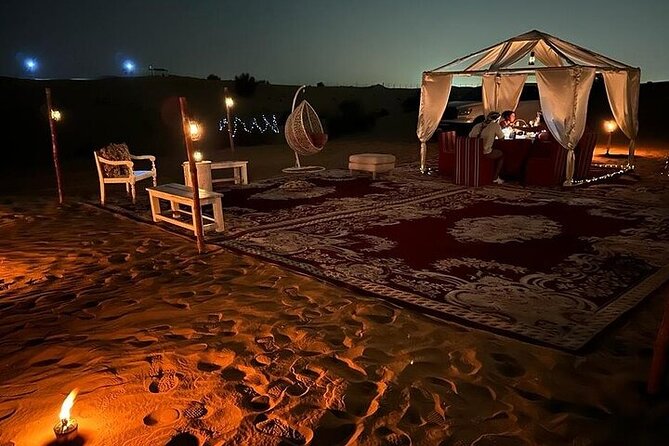 Private Dinner in the Heart of the Desert with Entertainment show - A private camp with carpets, fire, and dinner