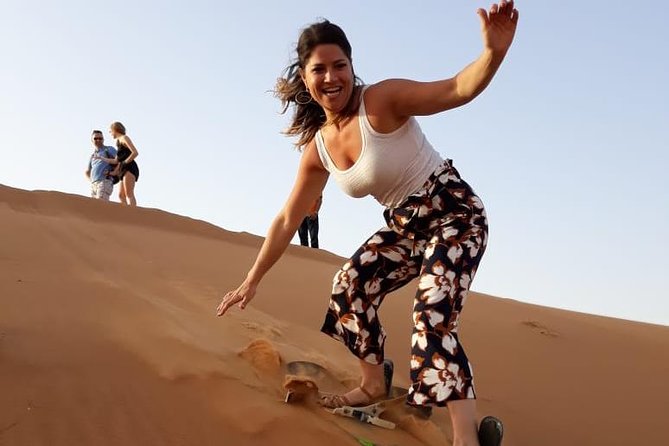 PRIVATE Dubai Desert Safari with BBQ Dinner and Shows - Camel riding and Bedouin-style camp activities
