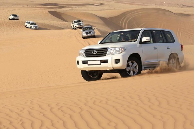 PRIVATE Dubai Desert Safari with BBQ Dinner and Shows - A sunset stop with one important caveat