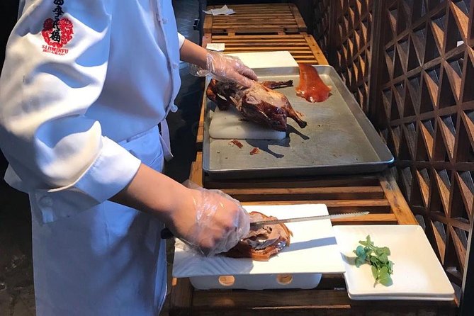 Private Tour to Pearl Market Acrobatic Show & Peking Duck Dinner - The Red Theatre performance at 7:30pm