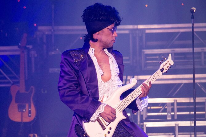 Purple Reign: The Prince Tribute Show at Planet Hollywood - At Miracle Mile Shops, the location helps your evening