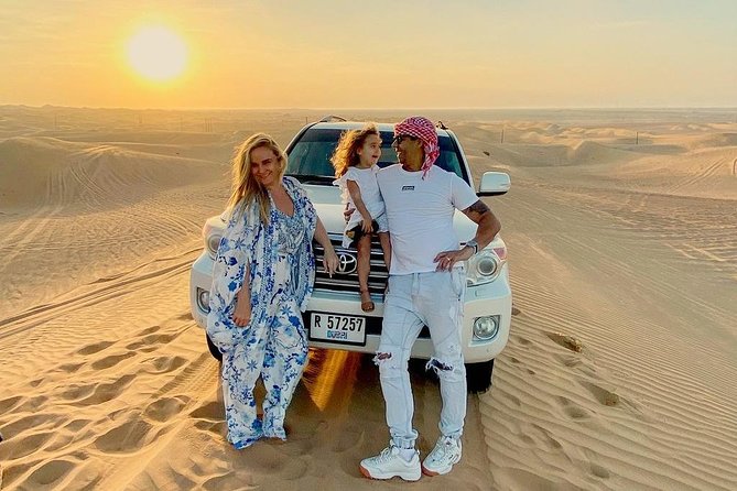 Red Dune Desert Safari with BBQ Dinner, Sand Boarding Dance Shows - Red dunes, sandboards, and a sunset start