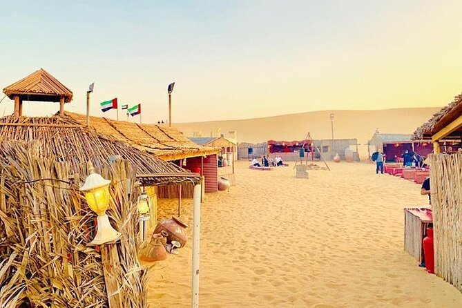 Red Dunes Desert Safari with BBQ Dinner, Camel Riding & Live Show - Belly dancing, tanura, and the fire show