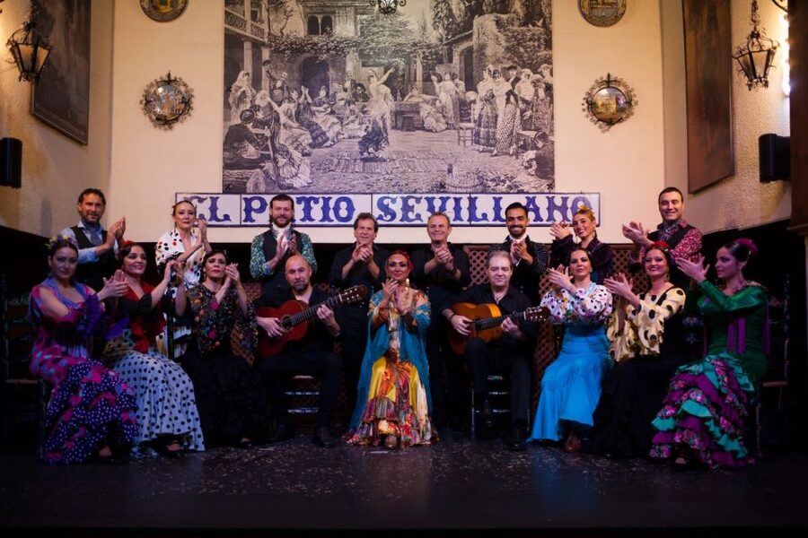 Seville: El Patio Sevillano Flamenco Show Ticket & Dinner - Fans, palillos, hats, and capes on stage