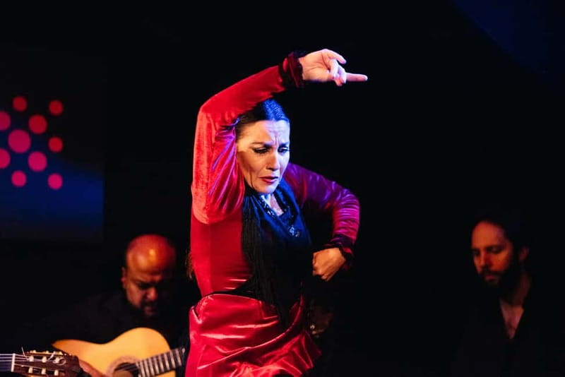 Seville: Tapas Walking Tour with Traditional Flamenco Show - First stop: cured meats, vermouth, and tapas lessons