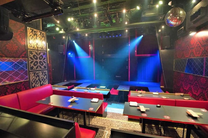 Tokyo GINZA: KONPARU Japanese Cabaret Show with Drink - Ginza after dark, with a theater below street level