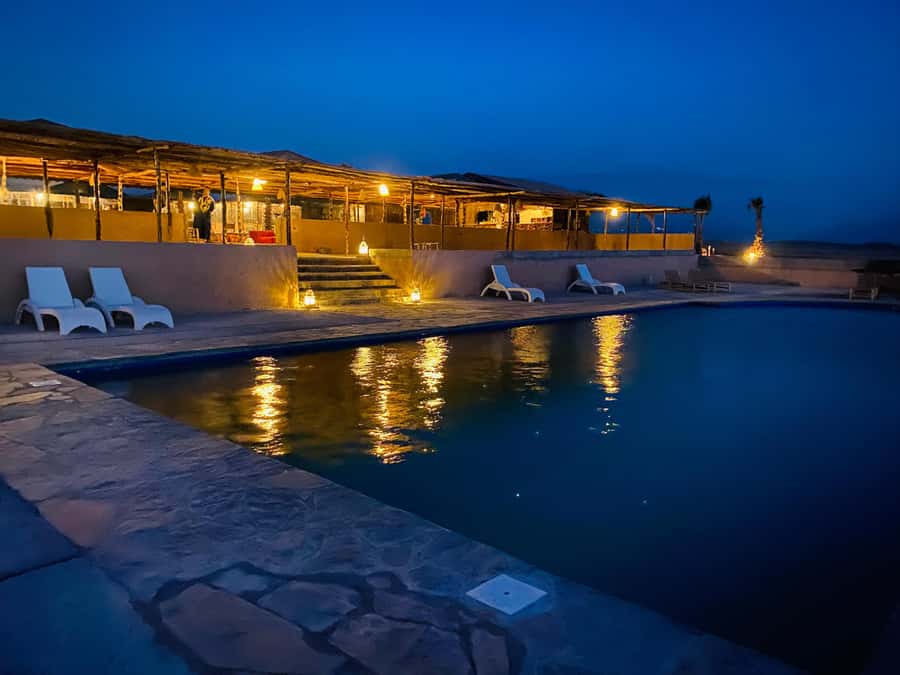 Unforgettable Desert Night: Dinner, Camel Ride & Quad Bike - Quad biking across the rocky desert