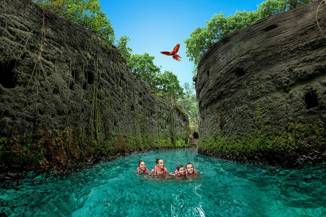 Xcaret Park Day Trip, transportation and Cultural Night Show - Swimming through Xcaret’s underground rivers